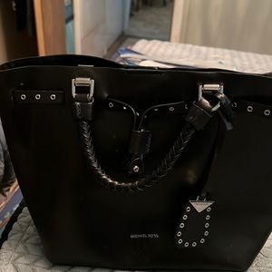 Almost like new very good condition black and silver Michael Kors bag